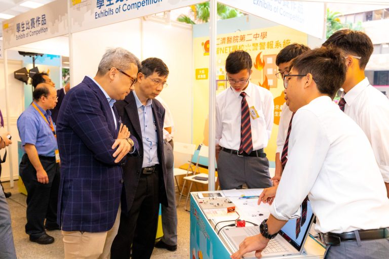 Students presenting fire alarm project